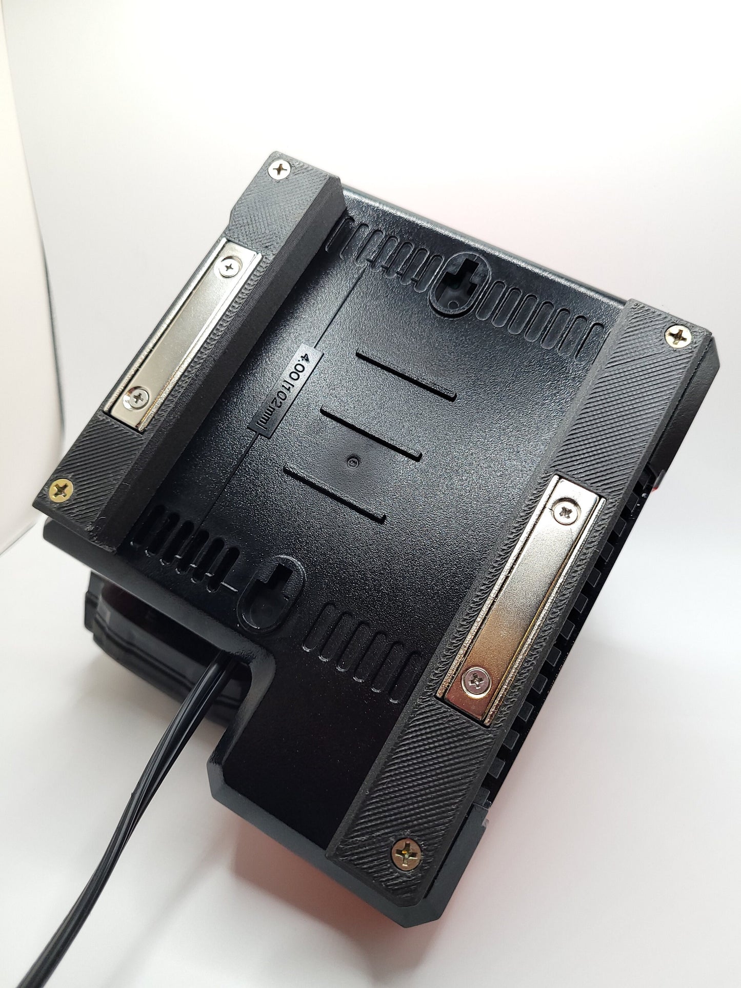 Milwaukee M12 M18 Charger Mount, Cat. No. 48-59-1812, Uses Two Neodymium Bar Magnets for Strong Hold on Metal Surface