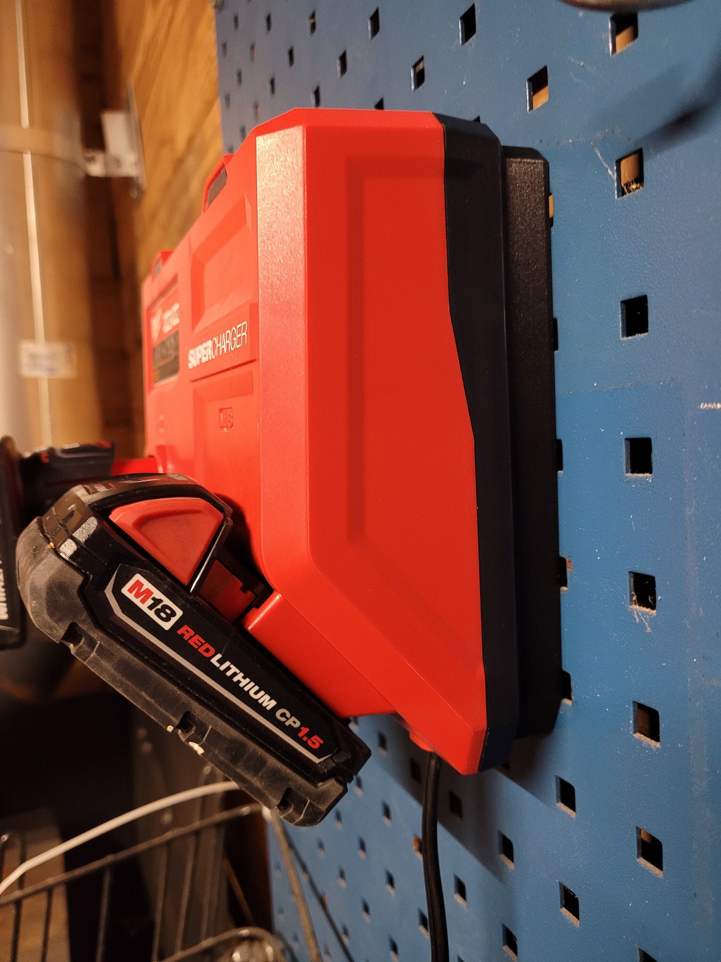 Milwaukee M12 M18 Rapid Charger Mount, Cat. No. 48-59-1808, Uses Two Neodymium Bar Magnets for Strong Hold on Metal Surface