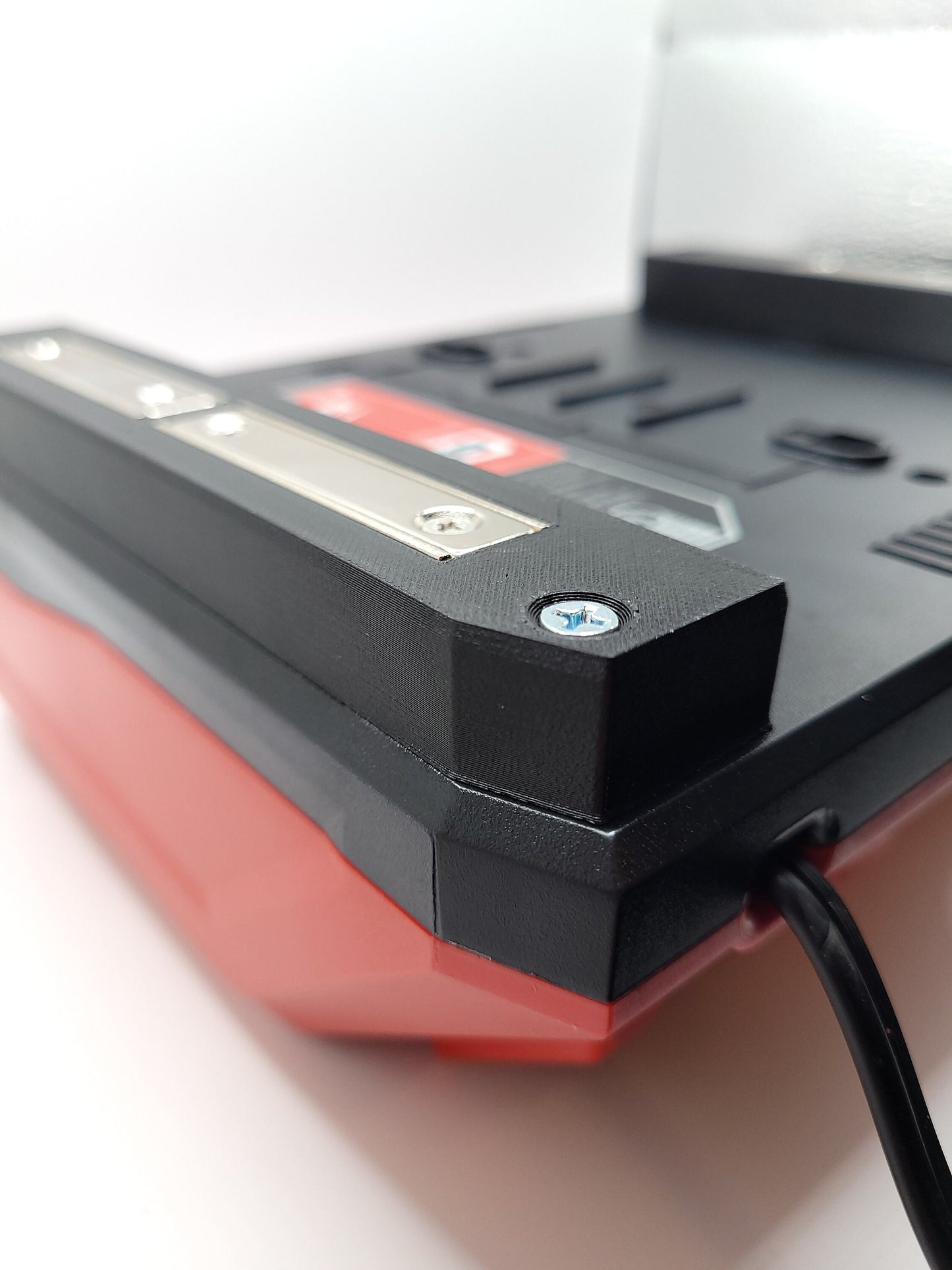 Milwaukee M12 M18 Super Charger Mount, Cat. No. 48-59-1811, Uses Three Neodymium Bar Magnets for Strong Hold on Metal Surface