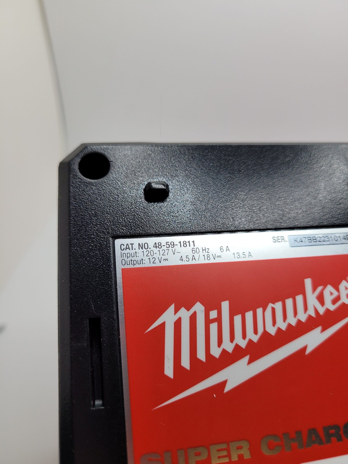 Milwaukee M12 M18 Super Charger Mount, Cat. No. 48-59-1811, Uses Three Neodymium Bar Magnets for Strong Hold on Metal Surface
