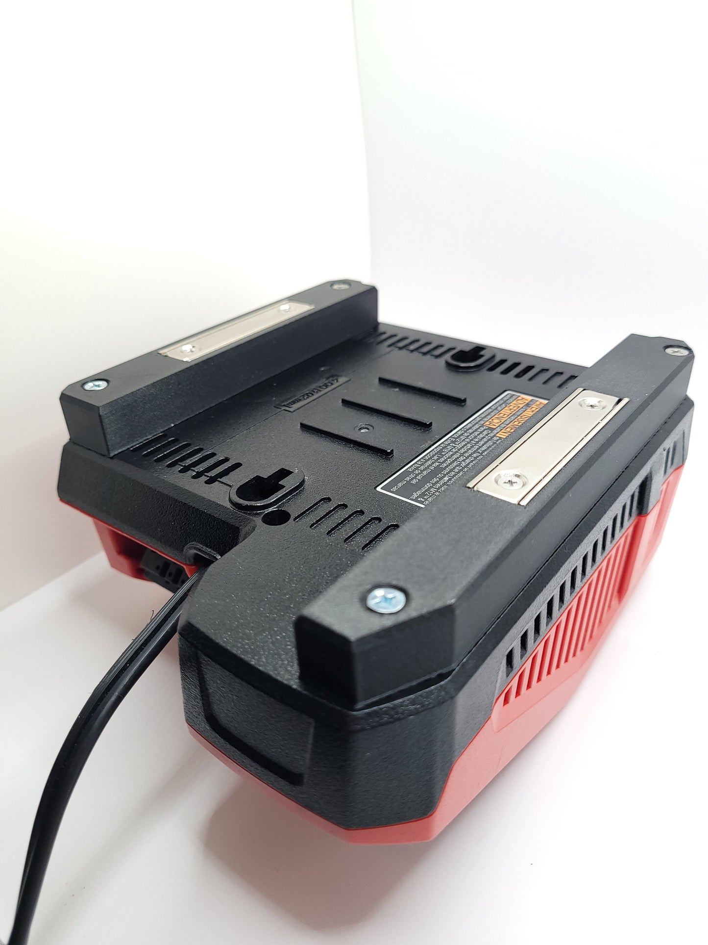 Milwaukee M12 M18 Rapid Charger Mount, Cat. No. 48-59-1808, Uses Two Neodymium Bar Magnets for Strong Hold on Metal Surface